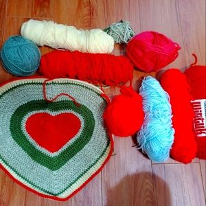 Acrylic yarn different colors (pink, white, yellow)